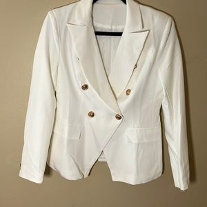 White blazer with gold buttons